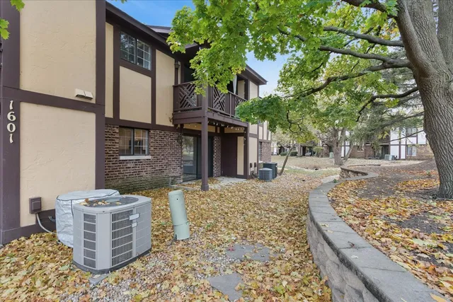 a view of a yard and front view of a house