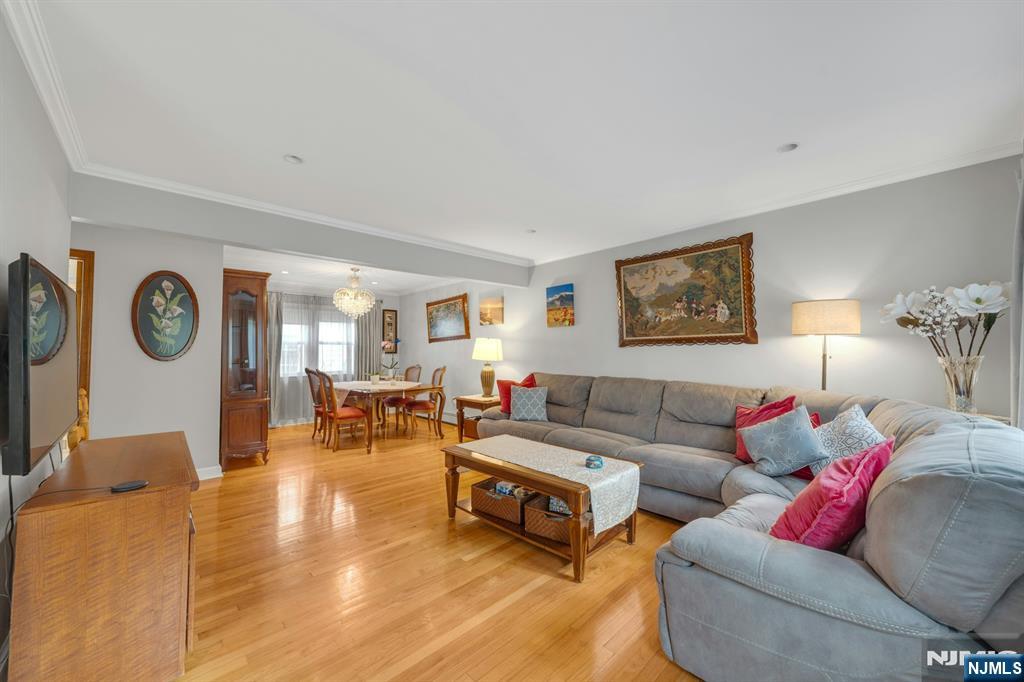 24 Cambridge Road Tenafly, NJ 07670 - Photo 8 of 31 a living room with furniture and a table