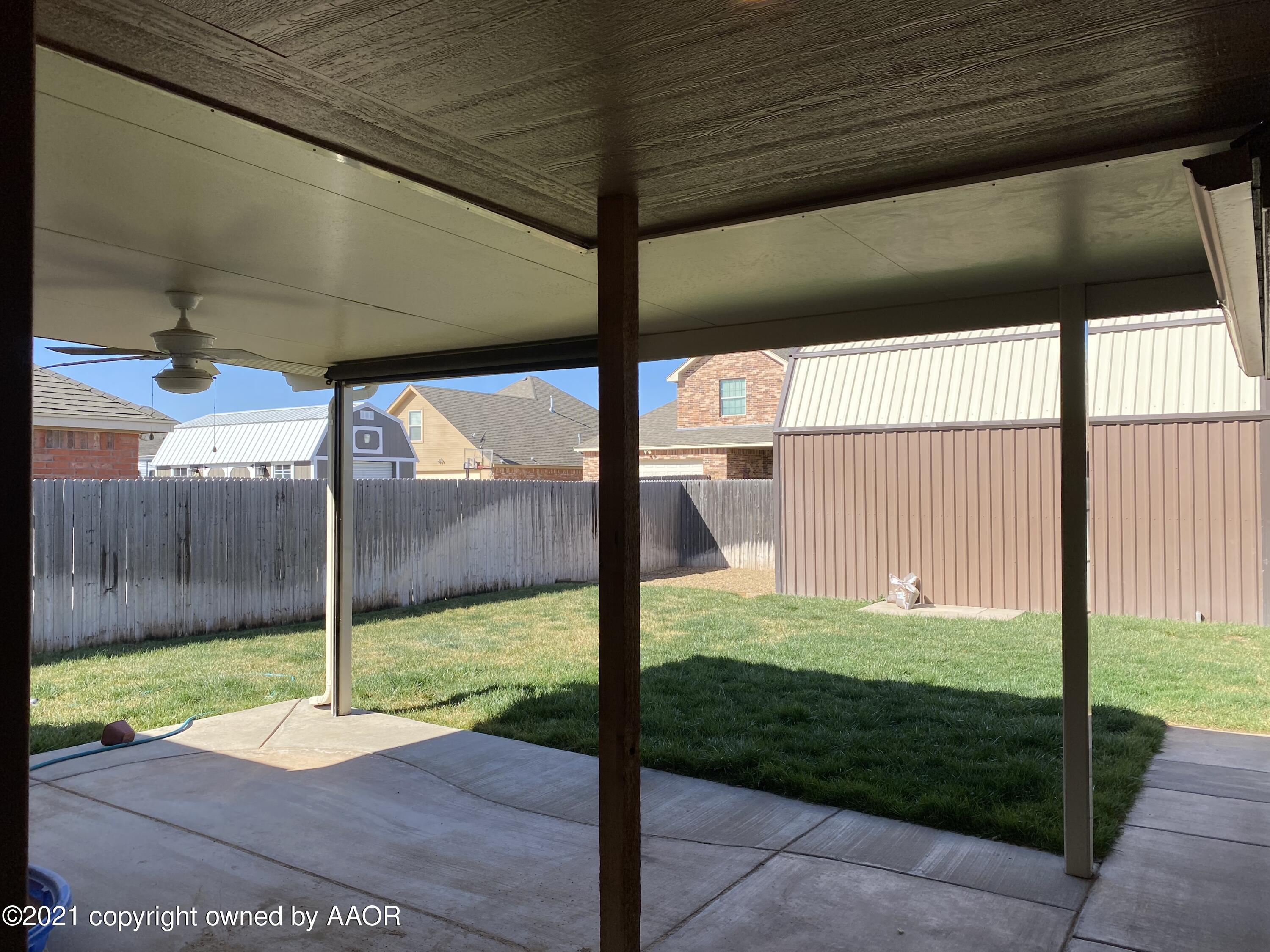 7304 Jacksonhole Drive Amarillo, TX 79118 - Photo 13 of 14 a view of a porch with a big yard