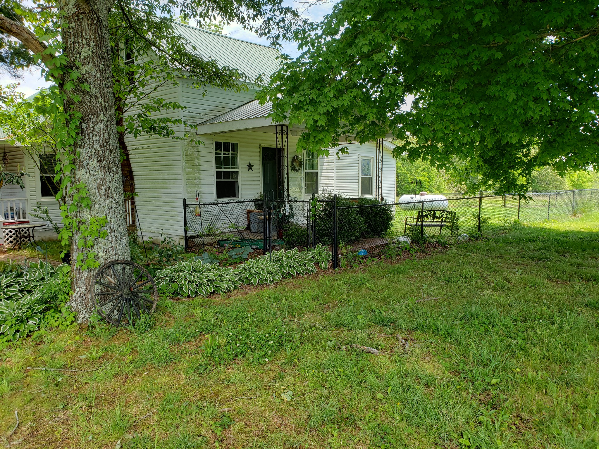 2570 Cheek Road Southside, TN 37171 - Photo 4 of 14 a view of a house with backyard and a tree
