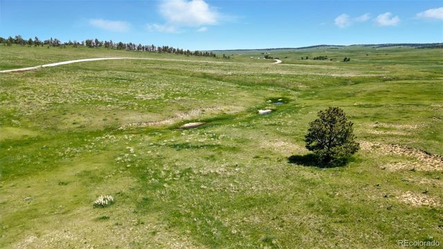 a view of an ocean and a mountain