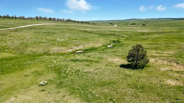 a view of an ocean and a mountain