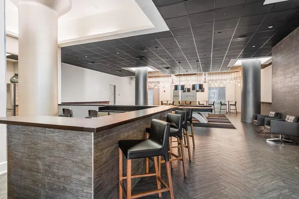a room with lots of counter space and windows