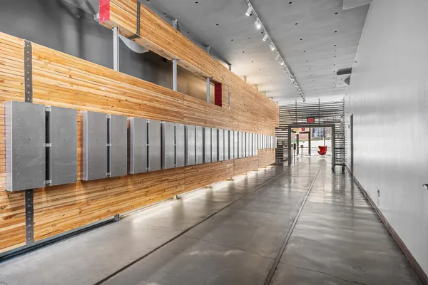 a view of gallery with wooden floor