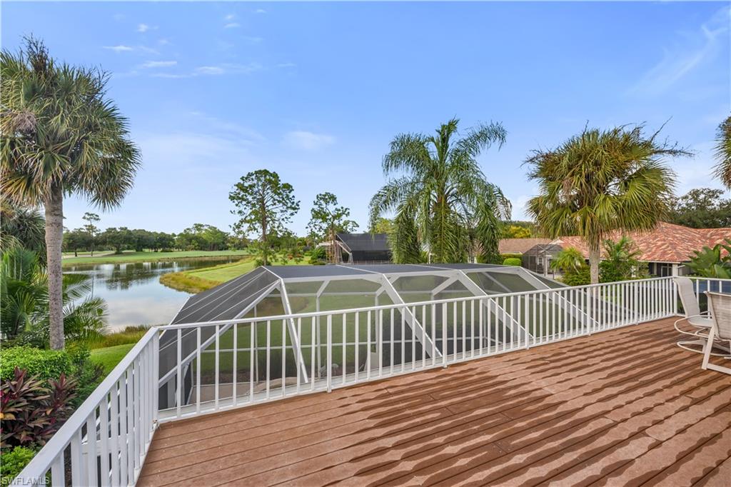 224 Edgemere Way South Naples, FL 34105 - Photo 17 of 35 Wooden deck off of the second floor with a lanai and a water view