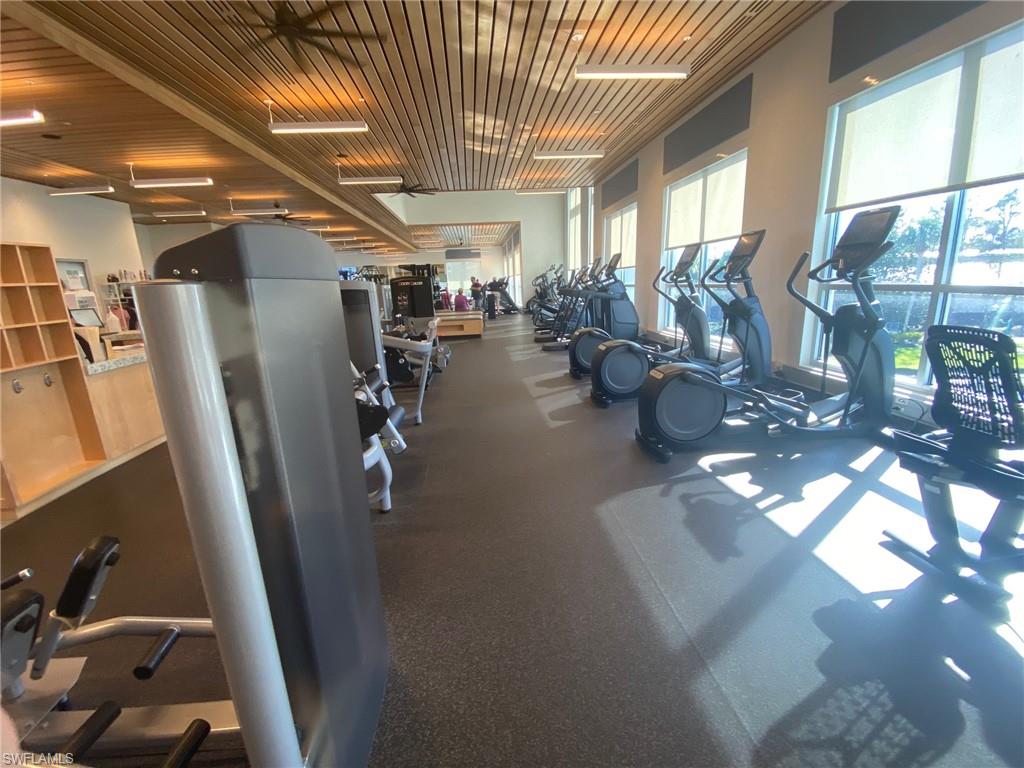 224 Edgemere Way South Naples, FL 34105 - Photo 26 of 35 Exercise room with wood ceiling