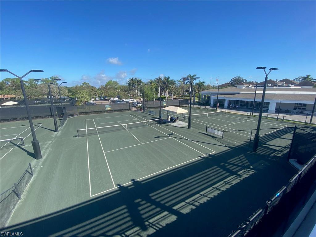 224 Edgemere Way South Naples, FL 34105 - Photo 33 of 35 View of tennis court with community basketball court