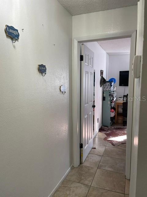 2131 Cascades Boulevard, Unit 301 Kissimmee, FL 34741 - Photo 20 of 30 a view of a hallway with elevator