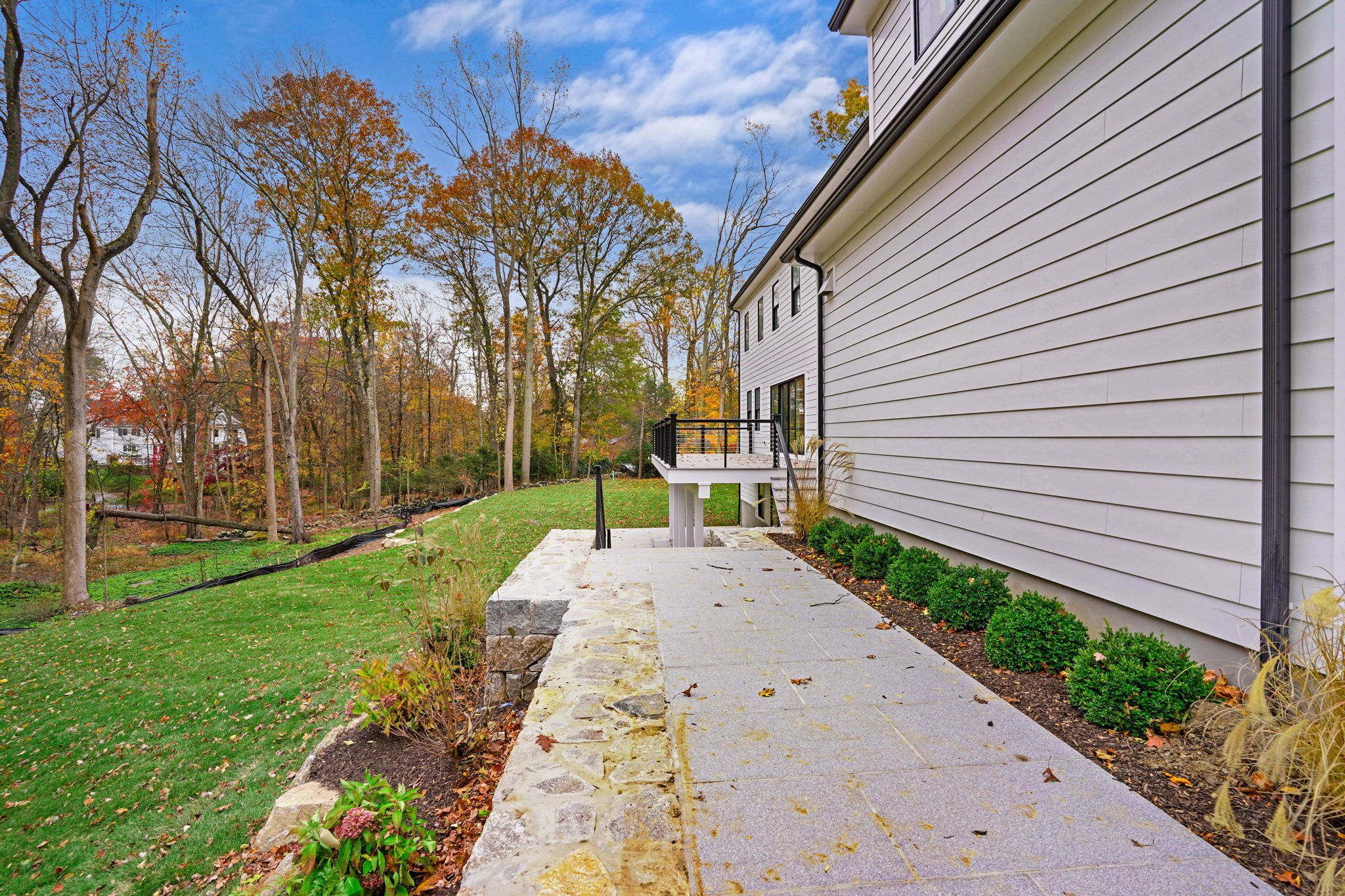 13 Terhune Drive Westport, CT 06880 - Photo 22 of 28 a view of a backyard with pathway