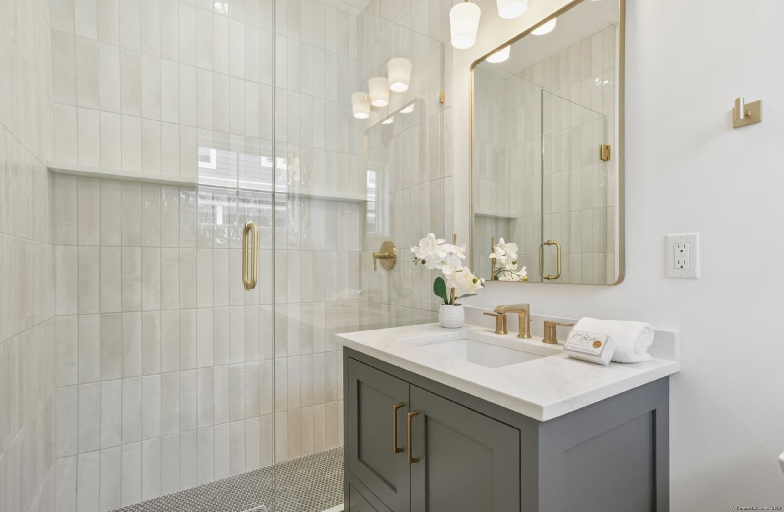 13 Terhune Drive Westport, CT 06880 - Photo 25 of 28 a bathroom with a sink and a mirror