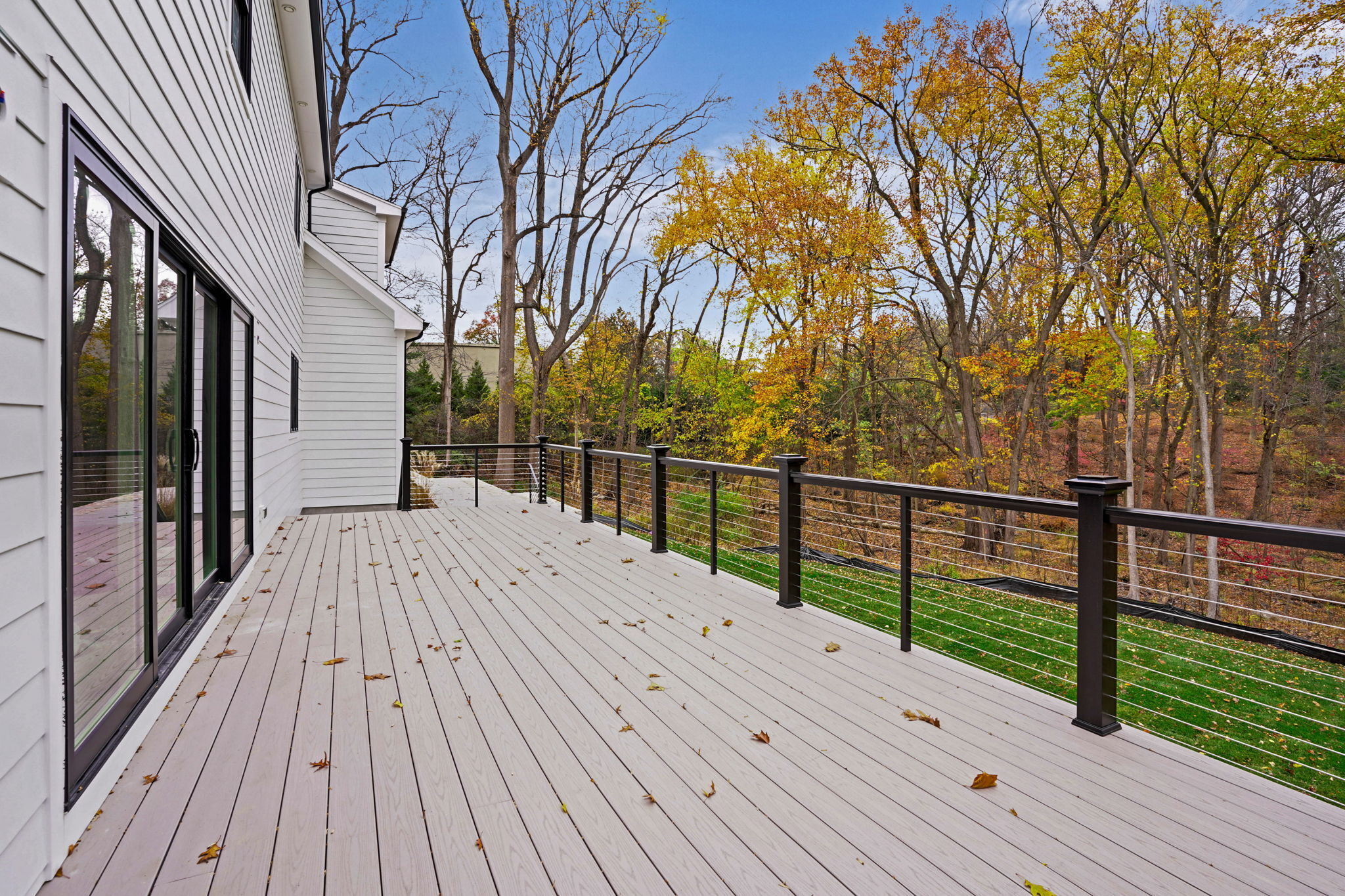 13 Terhune Drive Westport, CT 06880 - Photo 6 of 28 a view of a wooden deck with a trees