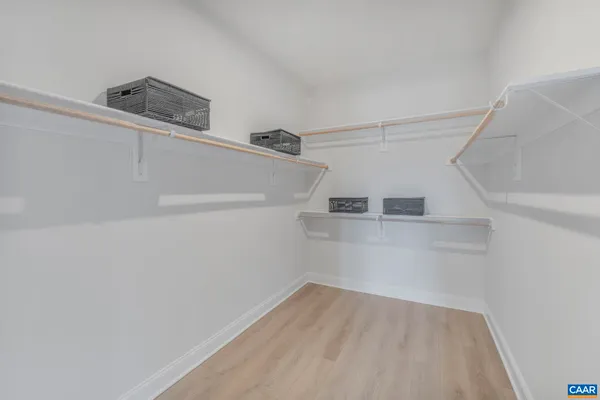 a view of a room with racks on the wall