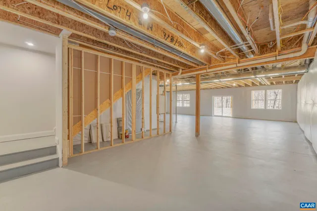 a view of a room with wooden walls
