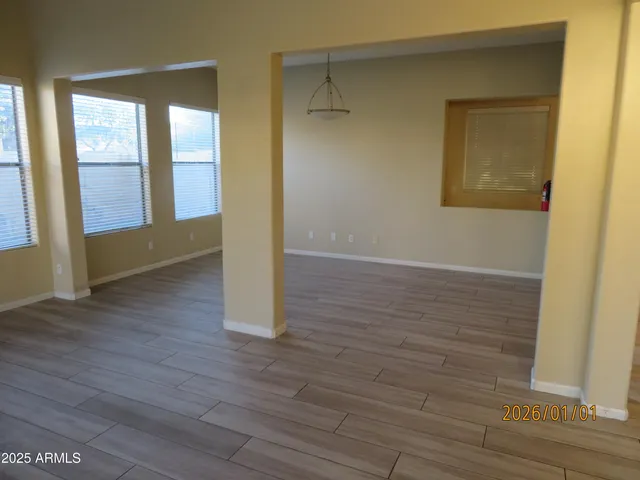 a kitchen with stainless steel appliances granite countertop a sink and a stove