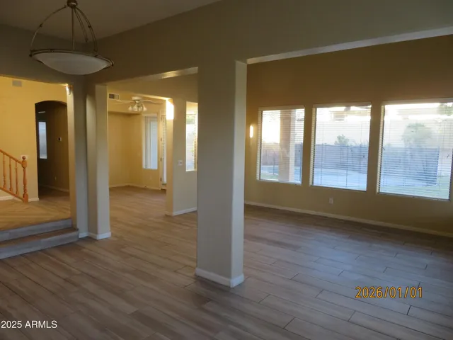 a kitchen with stainless steel appliances granite countertop a sink and a counter