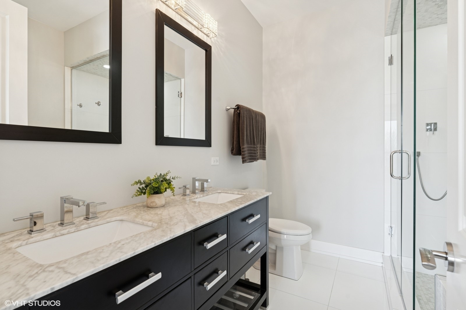 Undisclosed Address Chicago, IL 60657 - Photo 14 of 27 a bathroom with a granite countertop sink mirror and a toilet