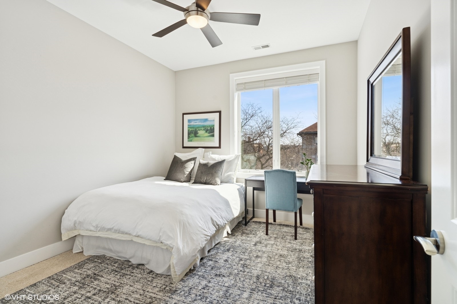 Undisclosed Address Chicago, IL 60657 - Photo 16 of 27 a bedroom with a bed and a window