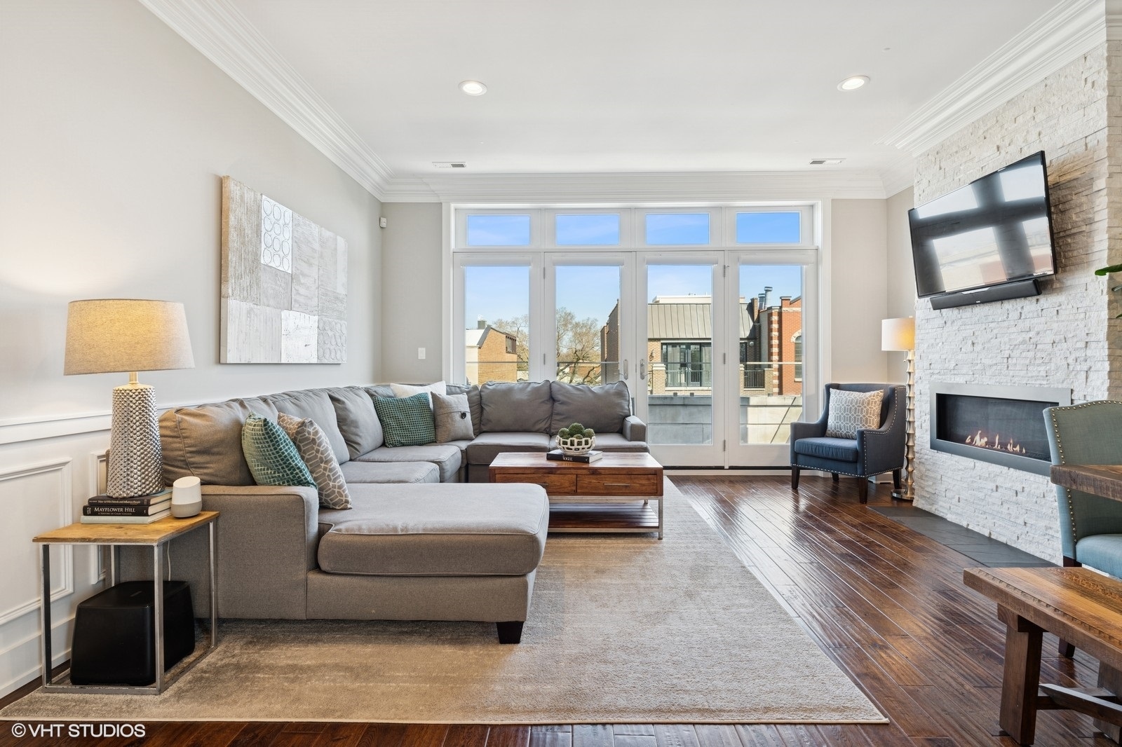 Undisclosed Address Chicago, IL 60657 - Photo 2 of 27 a living room with furniture and a fireplace
