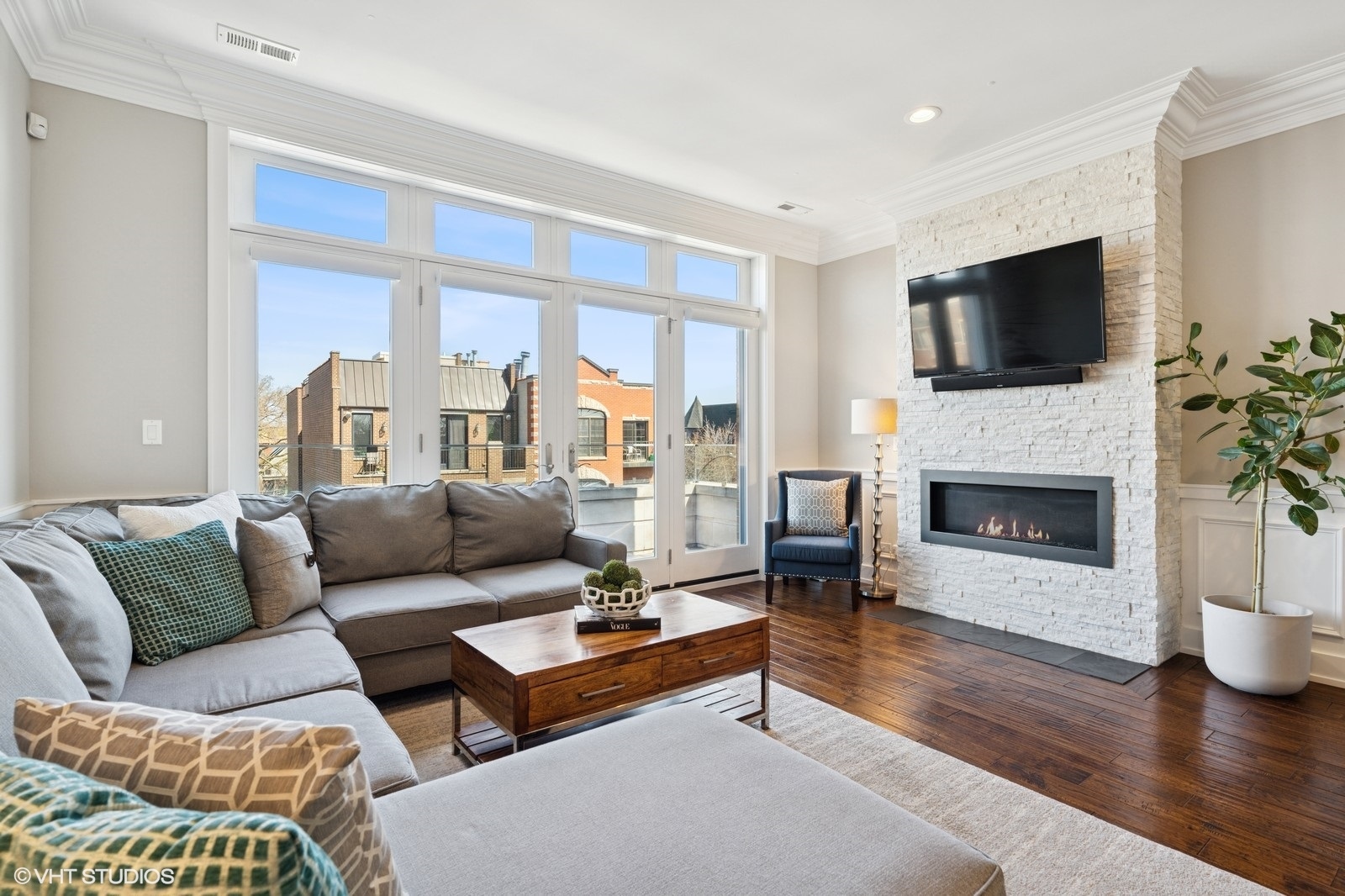 Undisclosed Address Chicago, IL 60657 - Photo 8 of 27 a living room with furniture fireplace and flat screen tv