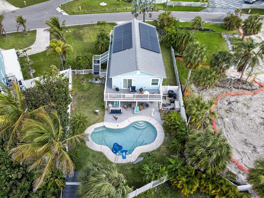 15823 Redington Drive Redington Beach, FL 33708 - Photo 29 of 39 an aerial view of a house with swimming pool and garden