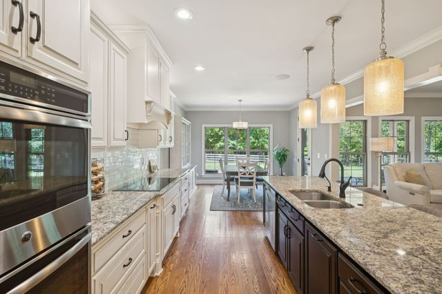 a shelf with books and knick knacks on it