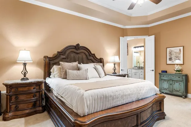 a bathroom with a granite countertop sink mirror and shower