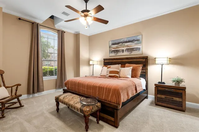 a bathroom with a granite countertop sink toilet and a mirror