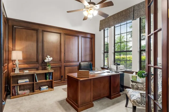 a view of a chairs and table in the balcony