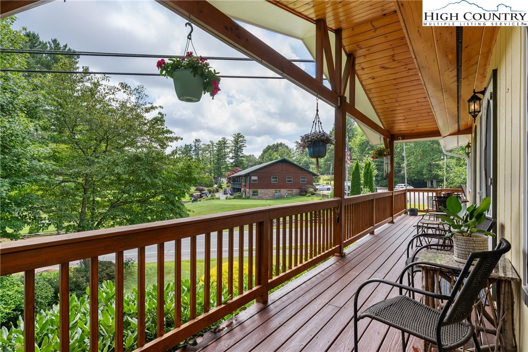 17 Elderberry Loop Newland, NC 28657 - Photo 4 of 47 a view of a chairs and table in the balcony
