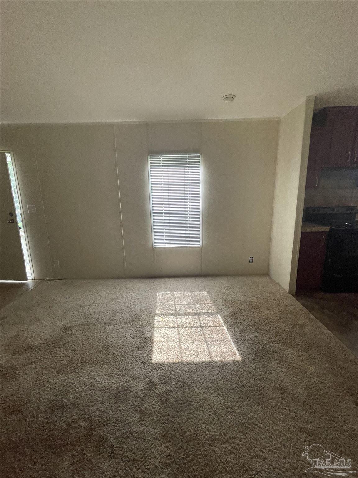 9520 Bridlewood Road Pensacola, FL 32526 - Photo 16 of 19 an empty room with windows