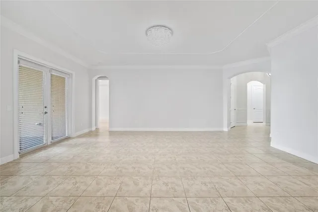a large kitchen with kitchen island a sink stainless steel appliances and cabinets