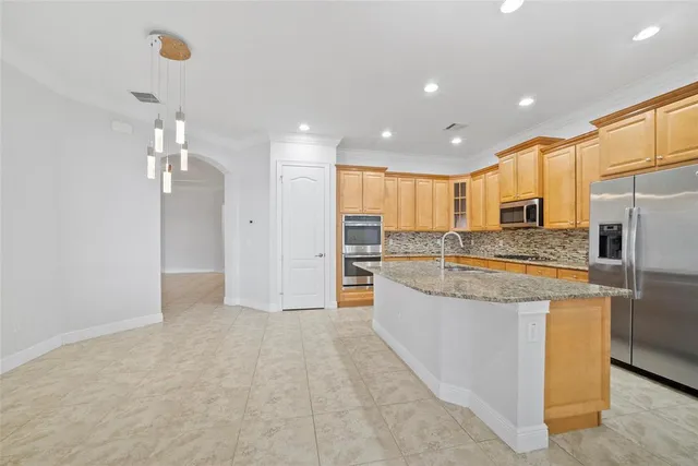 a view of a chandelier in big room