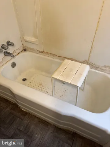 a bathroom with a bathtub