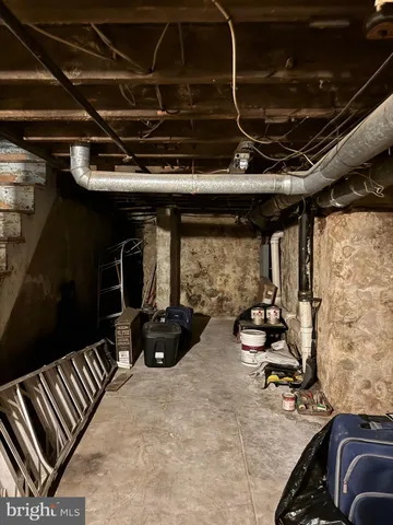 a view of parking garage with cars