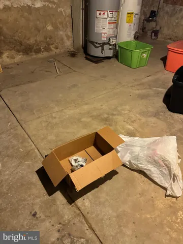 a room with a sink and a mirror