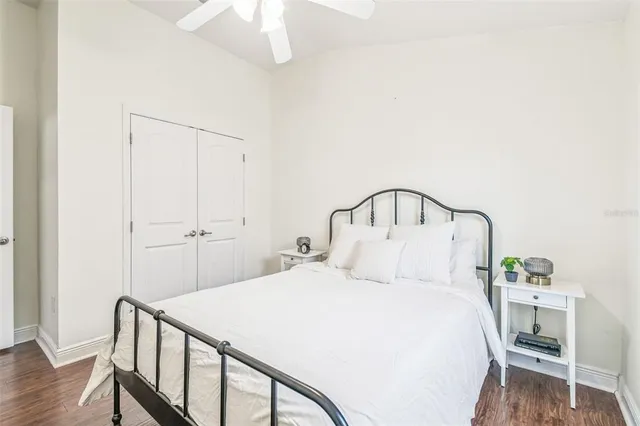 a bedroom with a bed and a table