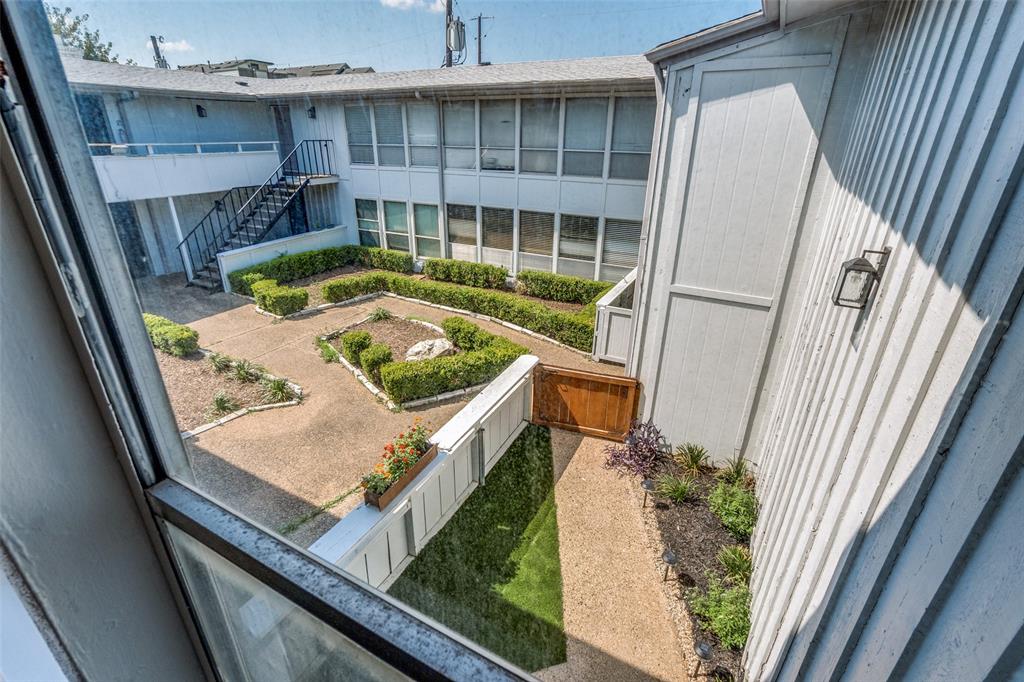 4347 Dickason Avenue, Unit 110 Dallas, TX 75219 - Photo 18 of 24 a view of a living room and furniture