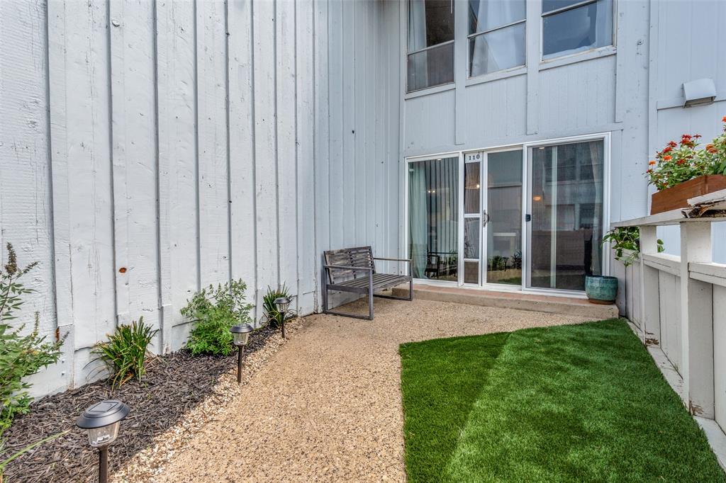 4347 Dickason Avenue, Unit 110 Dallas, TX 75219 - Photo 24 of 24 a backyard of a house with seating space