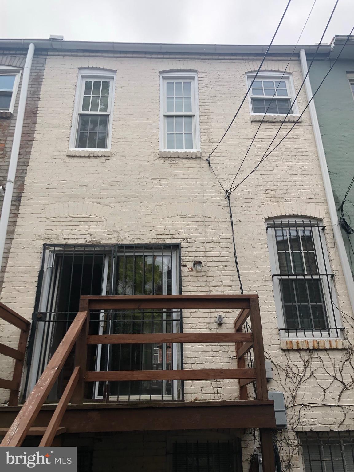 612 C Street Northeast Washington, DC 20002 - Photo 17 of 22 Back of home, deck off of livinbg room
