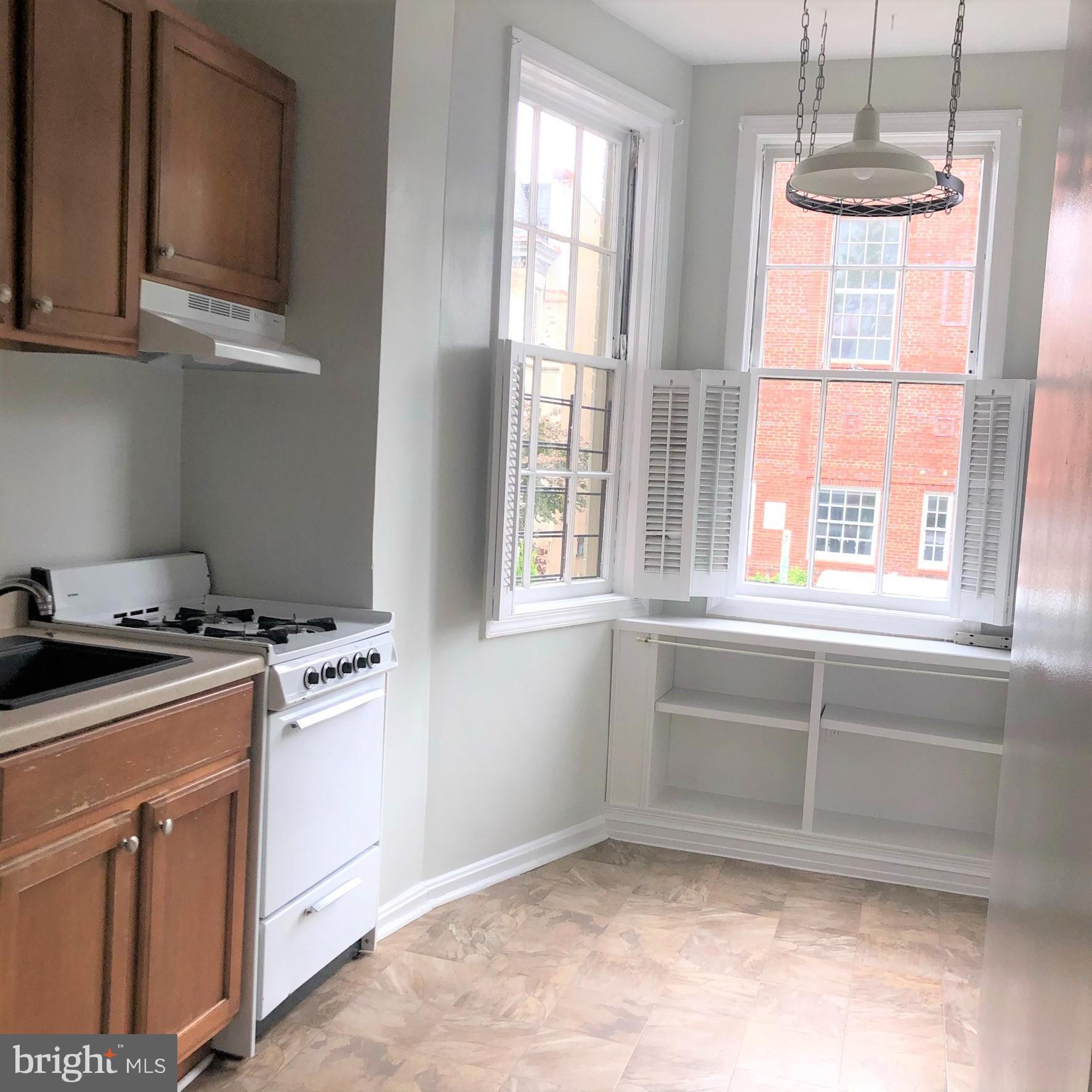 612 C Street Northeast Washington, DC 20002 - Photo 9 of 22 Bright country type kitchen, room for a table