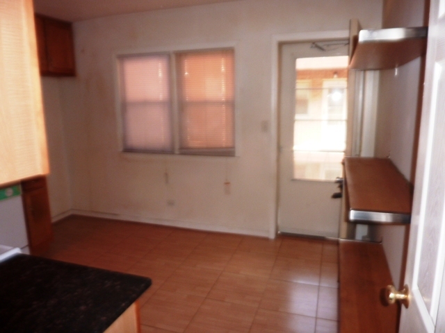 6733 West Irving Park Road, Unit 2C Chicago, IL 60634 - Photo 3 of 10 a view of an empty room with a window