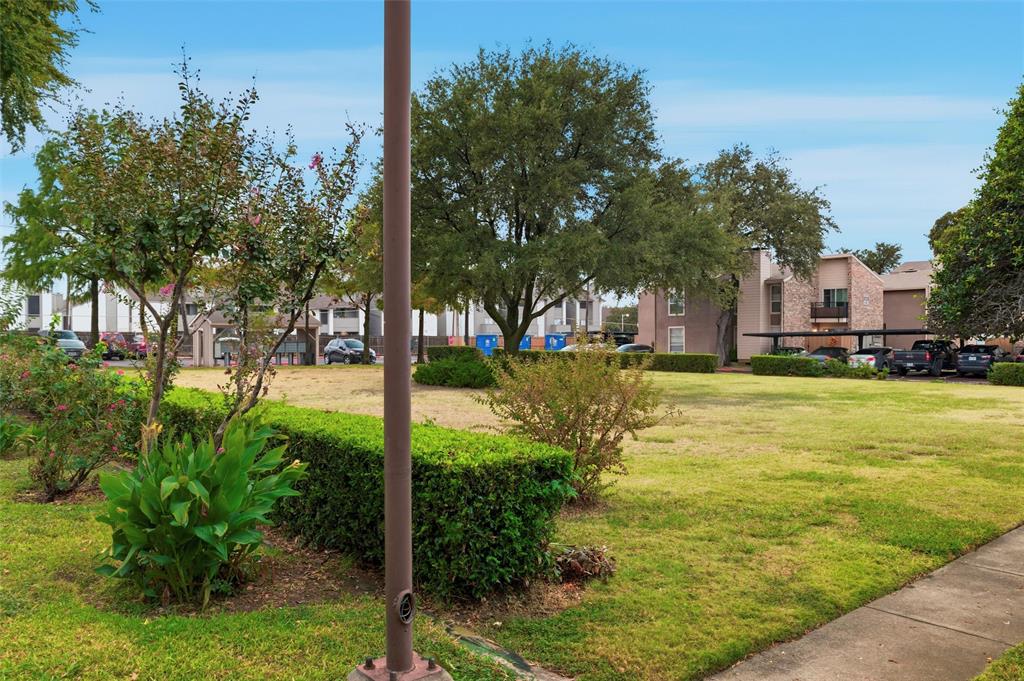 5604 Boca Raton Boulevard, Unit 248 Fort Worth, TX 76112 - Photo 23 of 25 a view of a yard with palm trees