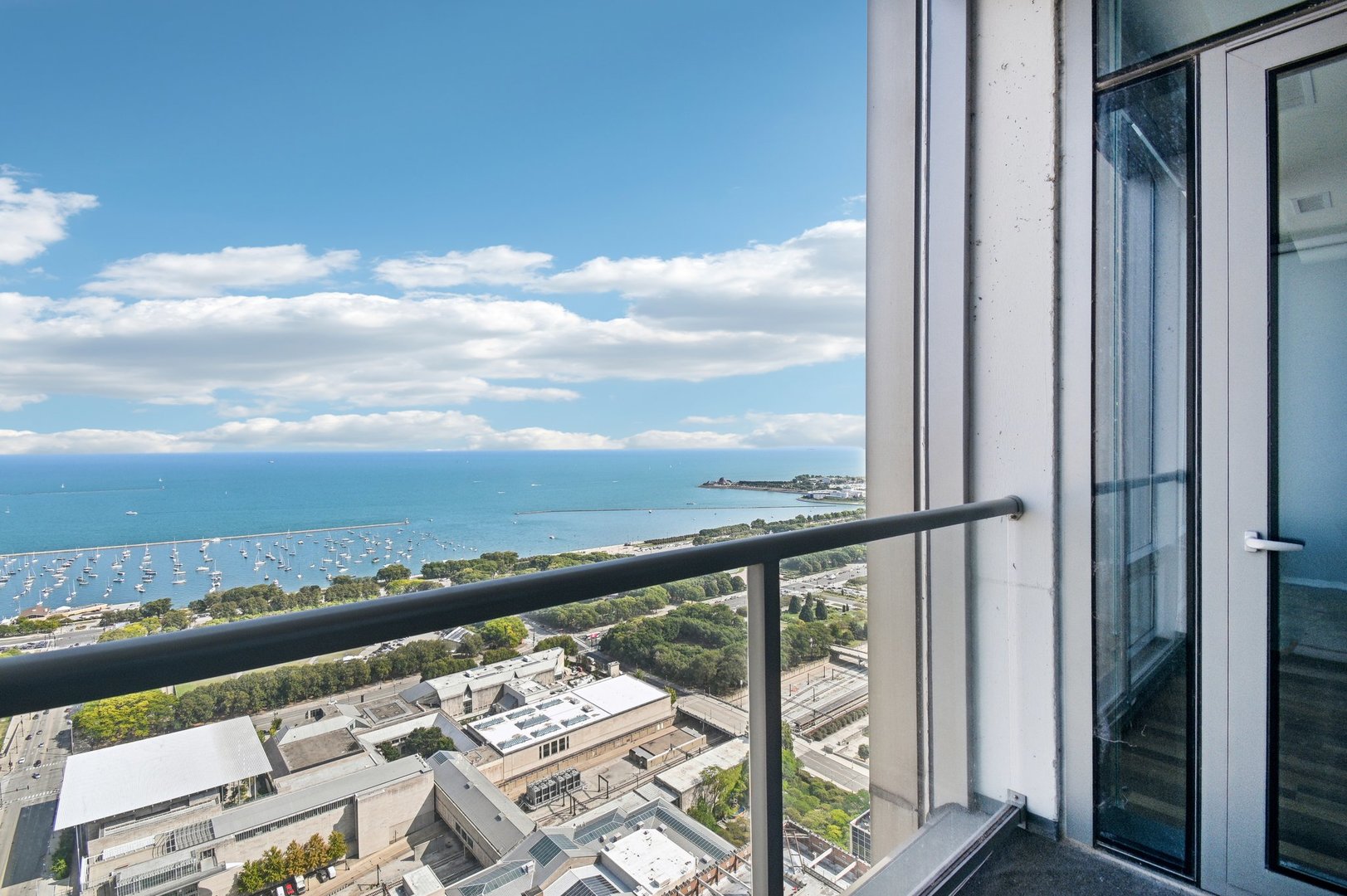 65 East Monroe Street, Unit 4521 Chicago, IL 60603 - Photo 12 of 42 a view of a balcony with an ocean view