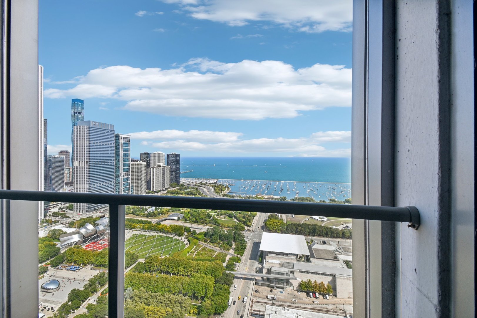 65 East Monroe Street, Unit 4521 Chicago, IL 60603 - Photo 13 of 42 a view of a city from a balcony