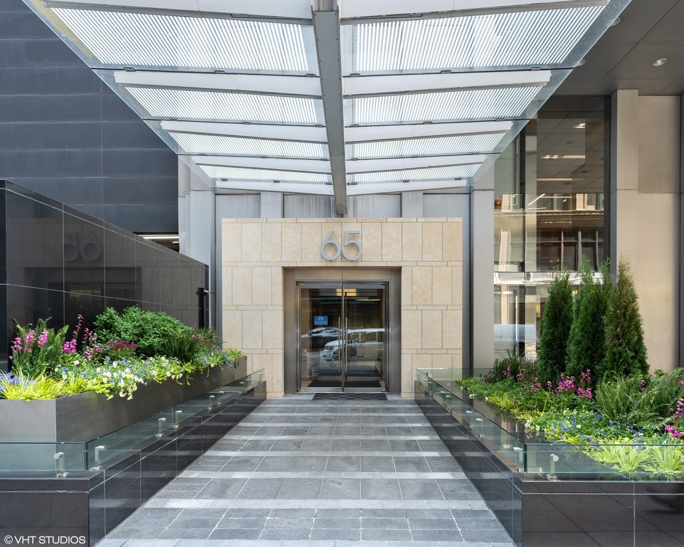 65 East Monroe Street, Unit 4521 Chicago, IL 60603 - Photo 2 of 42 a front view of a house with a garden