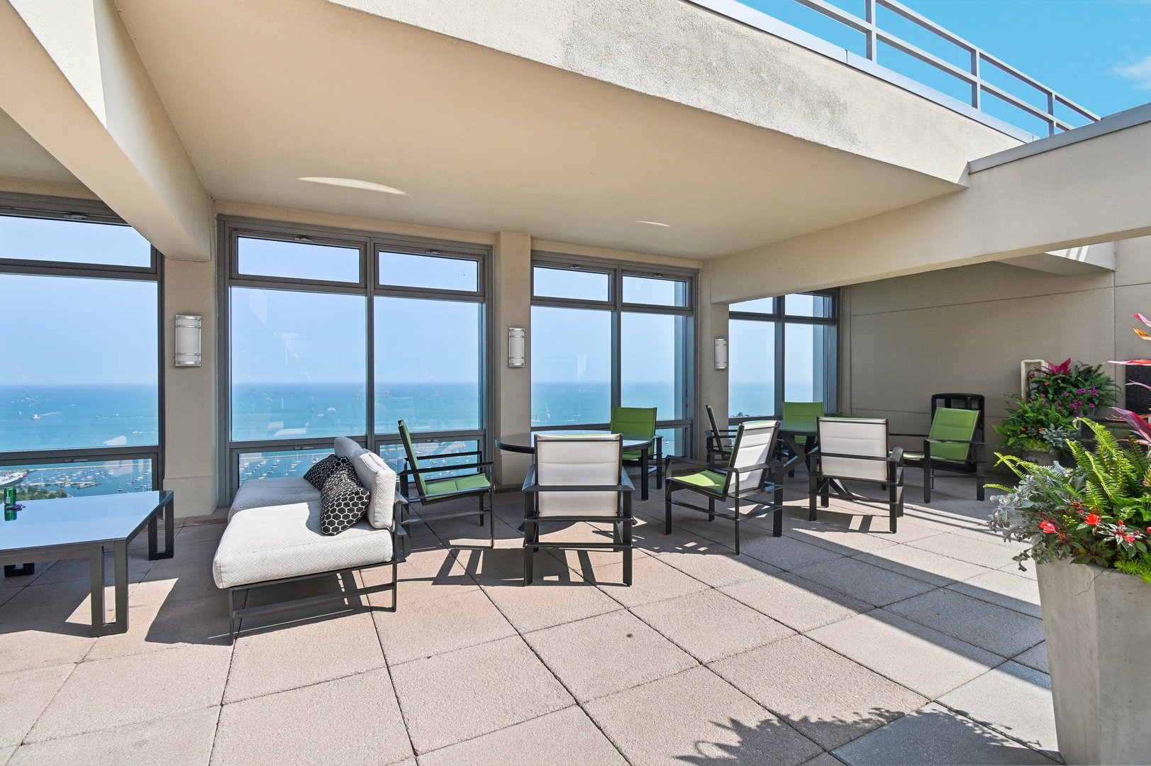 65 East Monroe Street, Unit 4521 Chicago, IL 60603 - Photo 28 of 42 a living room with furniture and floor to ceiling windows