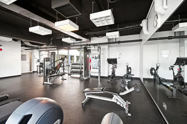 a view of a room with gym equipment