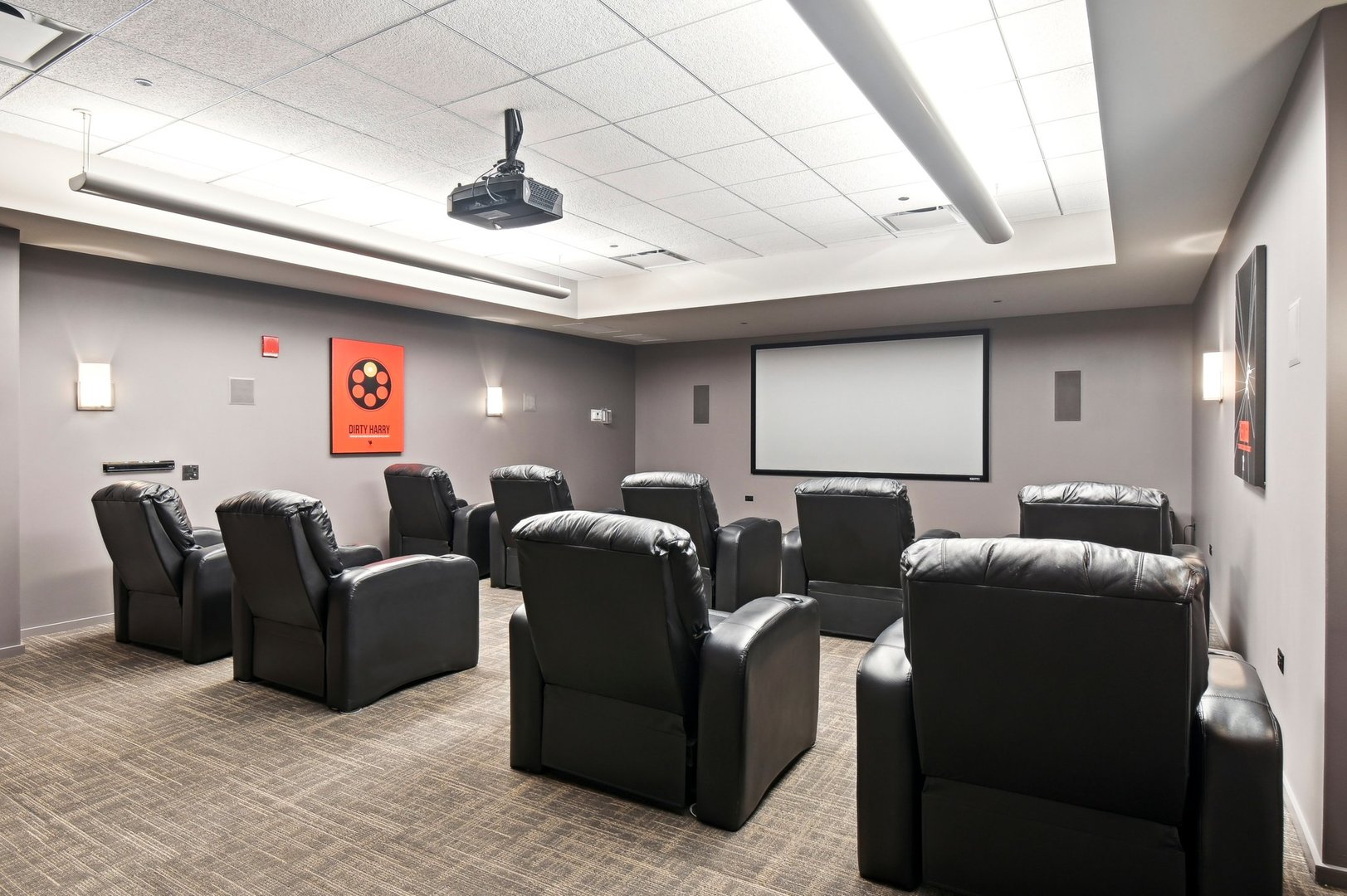 65 East Monroe Street, Unit 4521 Chicago, IL 60603 - Photo 37 of 42 a media room with lots of chairs and a projector screen