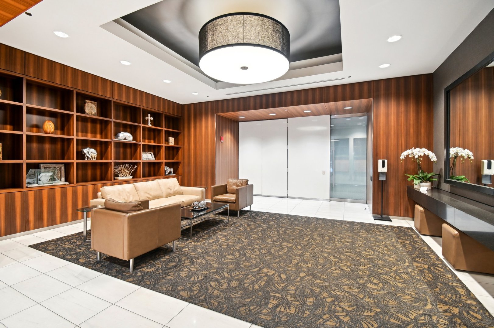 65 East Monroe Street, Unit 4521 Chicago, IL 60603 - Photo 39 of 42 a living room with a couch and potted plant