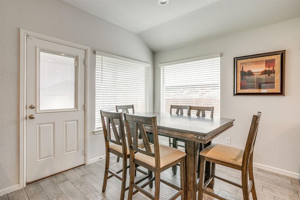 2313 Stallings Road Fort Worth, TX 76108 - Photo 14 of 30 a view of a dining room with furniture and window